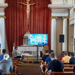 children sat in a church