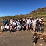 Group of students with a dog, in Lesotho