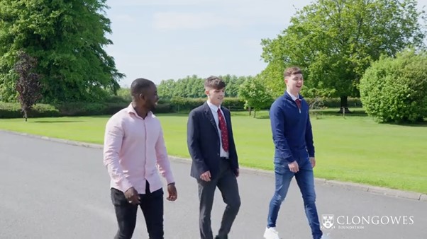 3 students walking